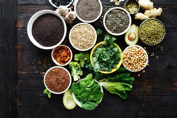 Obraz na płótnie Canvas Set raw seed cereals beans superfoods green vegetables vegetarian diet food