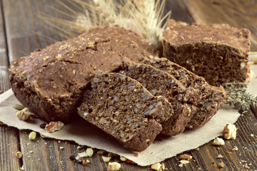 baked bread on wooden table background