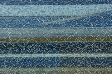texture of a piece of glass with cracks