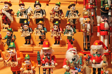 Colorful smokers and nutcrackers at a traditional Christmas market in Rothenburg, Germany.