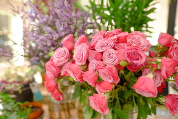 Obraz na płótnie Canvas Romantic Flower bouquet arrangement with hot pink rose and purple Gypsophila