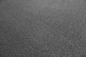 New black asphalt close up.