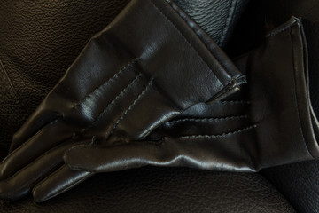 Black leather gloves, landscape orientation, with copy space.