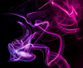 Colored smoke on black background