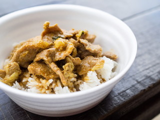 Red curry pork with rice in foam cup