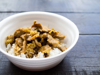 Red curry pork with rice in foam cup