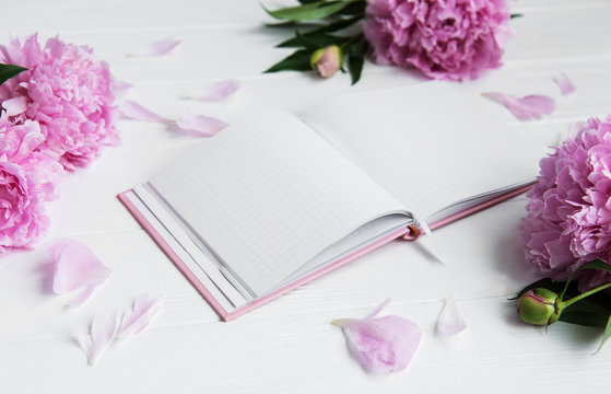 note book with peonies