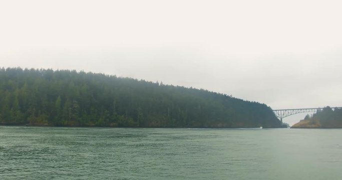 La Conner, WA tourist boat entering Puget Sound on a foggy summer morning