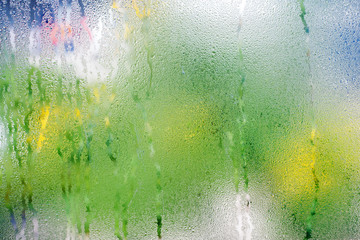 Water droplets condensation background of dew on glass window
