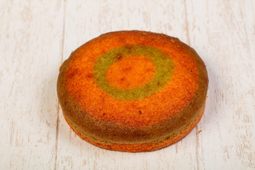 Tasty muffin over wooden