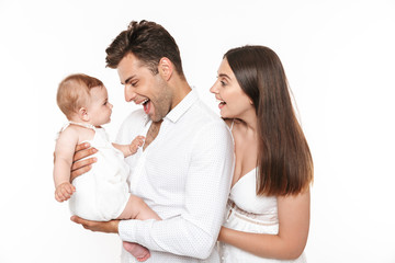 Portrait of a cheerful family with their little baby girl