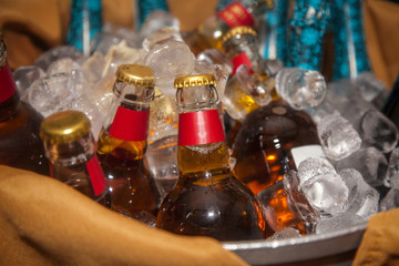 Bottled beer in an ice bucket