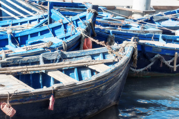 Fototapeta na wymiar Famous blue Boats at a Fishing Port of Essaouira on in Morocco 