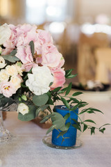 Bouquet of flowers on a wedding table. A beautiful wedding decor