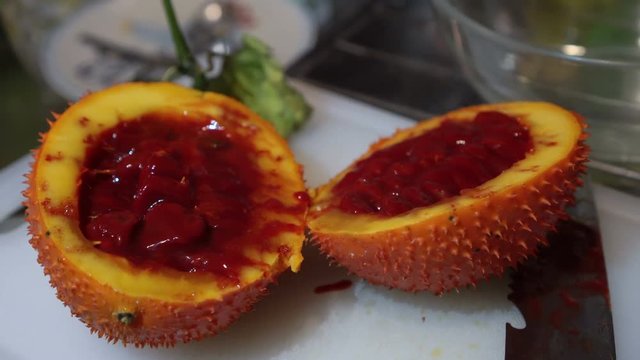 Gac fruit cut open, red healthy antioxidant food video