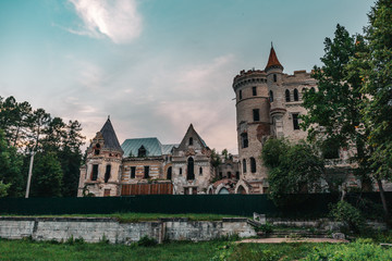 Fototapeta na wymiar Ruins of destroyed medieval ancient castle of estate of Khrapovitsky in Muromtsevo