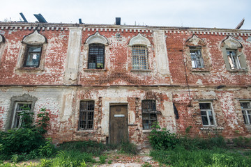 Old ruins of abandoned ruined red brick building