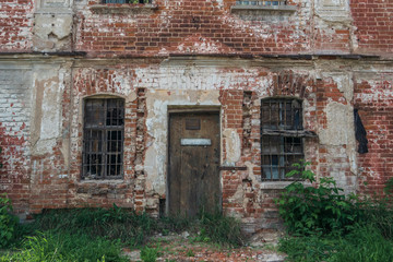 Old ruins of abandoned ruined red brick building