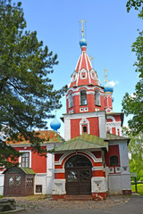 Fototapeta na wymiar UGLICH, RUSSIA. The bell tower of church of the tsarevitch Dimitrii on Blood (the 17th century) in summer day. Yaroslavl region