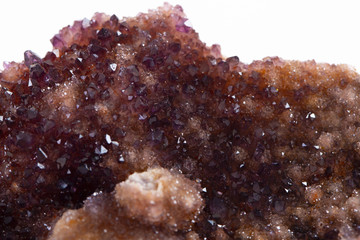 Crystal Stone macro mineral, purple rough amethyst quartz crystals on white background