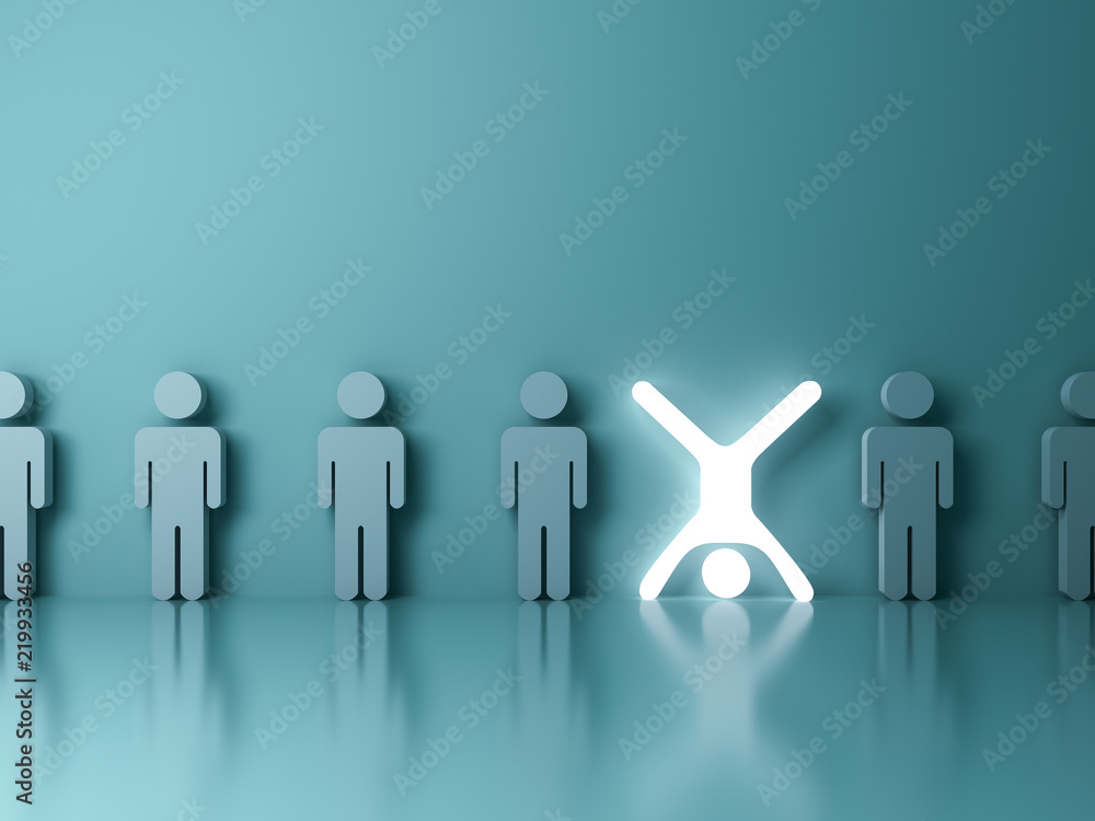Poster stand out from the crowd and different creative idea concept one glowing light man standing upside d