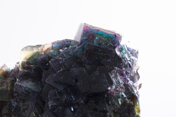 Macro mineral stone Fluorite crystal on a black background close-up