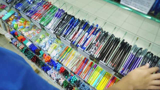 Back to school concept. Purchase of stationery in the store. Close-up.