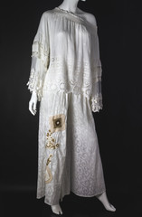 fashion shoot with dress and mannequin on black background