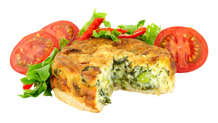 Crustless spinach and kale quiche with fresh salad isolated on a white background
