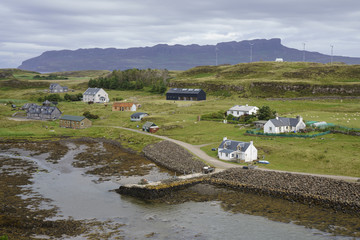 Port Mor is a harbor and settlement on the Isle of Muck in the Inner Hebrides off the West Coast of Scotland © rjcoulstock