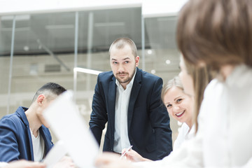 Group of business meeting at the table in the modern office ,Team work and diverse hands together joining business relationships with greetings and joint business partnership.