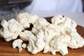 Cauliflower on wooden cutting board