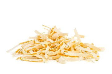 Dry raw uncooked noodles isolated on white background