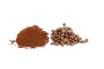 Pile of the ground coffee and beans isolated on white background