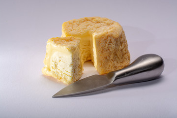 French AOC Langres soft cow crumbly cheese with washed rind structure made in Champagne-Ardenne region