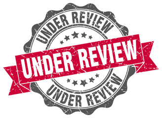 under review stamp. sign. seal