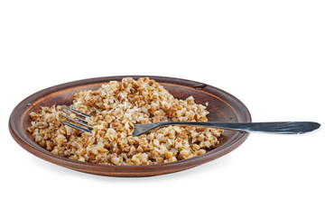 Ceramic plate with boiled buckwheat grains