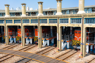 Fototapeta na wymiar Trains parked in fan-shaped train garage at railway roundhouse in Changhua Taiwan