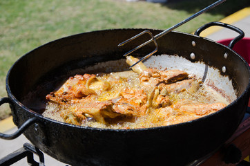 Chicken fried in pan with Hot oil