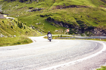 Motorcyclist turning on Transfagarasan winding road