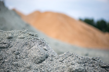 Large piles of construction sand and gravel used for asphalt production and building. Limestone...