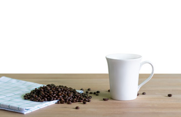 Roasted coffee beans with coffee cup on wooden. Isolated background.