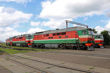 passenger locomotives in the parking lot	