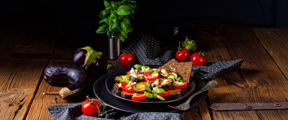 Eggplant grilled with aromatic feta cheese and tomatoes