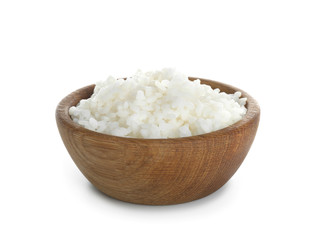 Wooden bowl with freshly cooked rice on white background