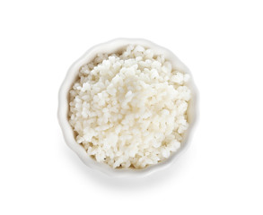 Fototapeta na wymiar Bowl with freshly cooked rice on white background