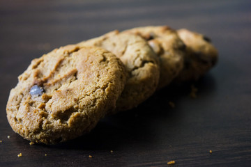 Cookies on dark wooden background