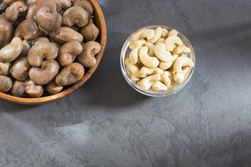 Walnuts and cashew oil on the table - Anacardium occidentale. marañón