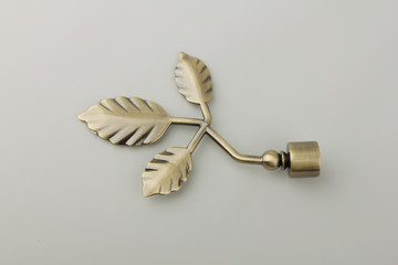 Tips for curtain poles on a white background. Ending for curtain eaves. Finials for curtain cornices.