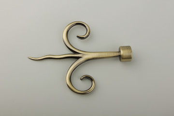 Tips for curtain poles on a white background. Ending for curtain eaves. Finials for curtain cornices.